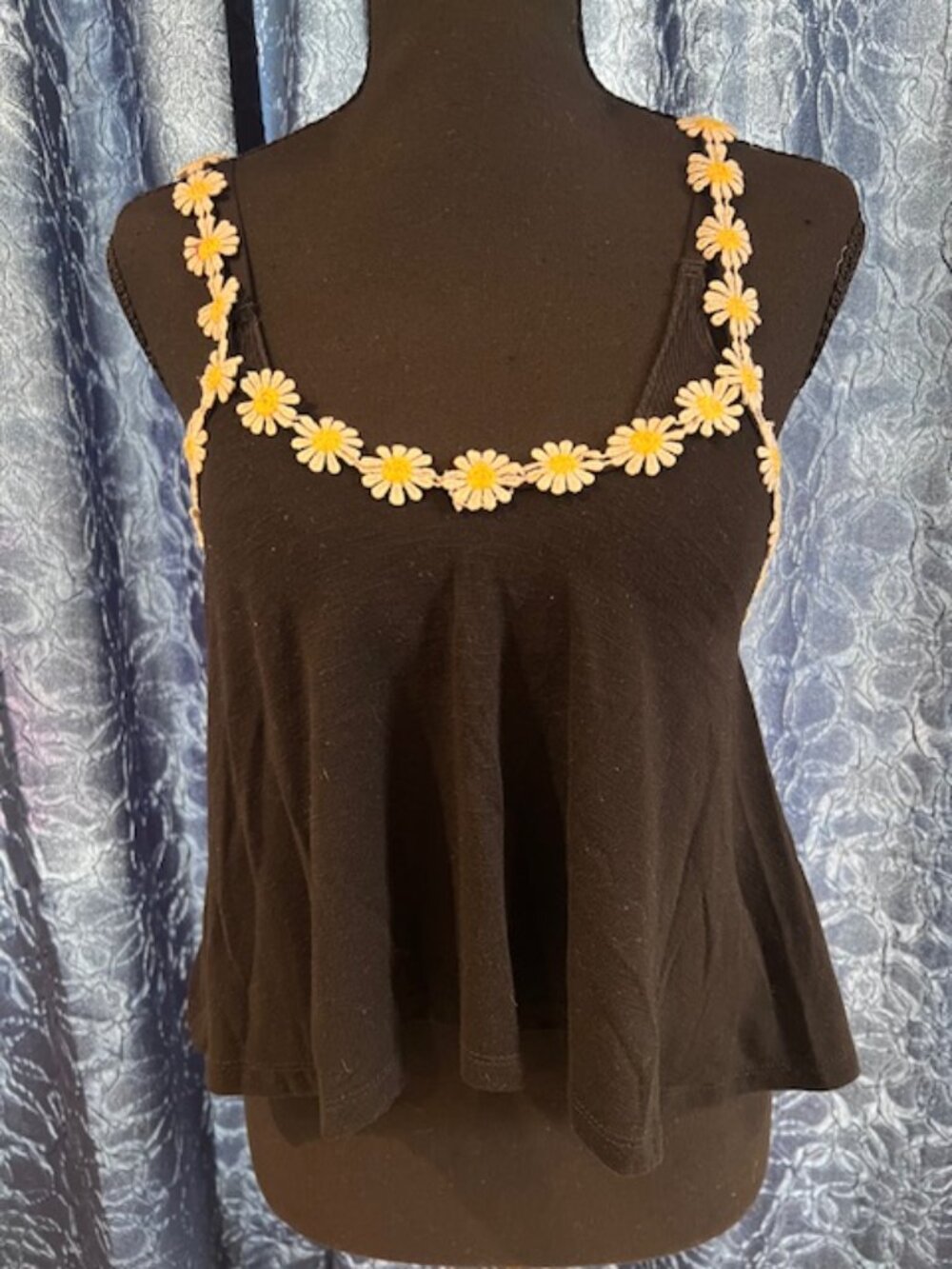 POOF APPAREL racerback black tank trimmed with embroidered daisy Women's Med